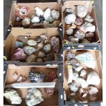 A large collection of mineral samples and geodes including gypsum, agate, quartz, sodalite,