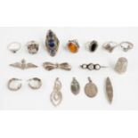 A collection of silver jewellery including rings, pendants, RAF sweetheart brooch and a plated