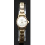 Omega gold plated ladies wristwatch with date aperture, black hands, gold centre seconds hand and