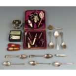 Eight hallmarked silver teaspoons, weight 157g, two folding mother-of-pearl and hallmarked silver