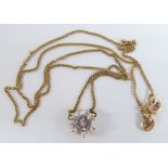 A 14k gold necklace set with a cubic zirconia, 18cm drop, 2.2g all in