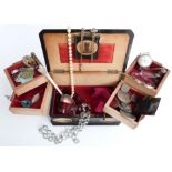 A collection of costume jewellery including silver spoon, silver pendant set with a miniature,