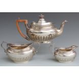 Edward VII hallmarked silver three piece teaset with reeded decoration, Sheffield 1902 maker Martin,