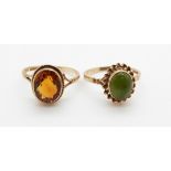 A 9ct gold ring set with citrine and a 9ct gold ring set with a jade cabochon, 3.9g