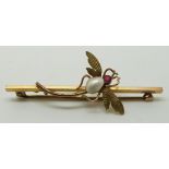 9ct gold brooch set with a pearl and a garnet in the form of a dragonfly