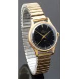 Smiths De Luxe gold plated gentleman's wristwatch with gold hands and baton markers, black dial