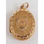 Victorian yellow metal locket with chased and buckle decoration, 3.7g, 2cm long