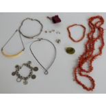 A silver necklace, two coral necklaces, silver bracelet, silver earrings etc