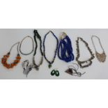 A collection of beaded necklaces including glass, white metal Eastern jewellery, glass beads, etc