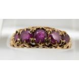 Victorian 15ct gold ring set with five graduated rubies, Birmingham 1866, 1.7g, size M