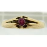 An 18ct gold ring set with a ruby, Birmingham 1918, 3.4g, size P