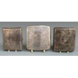 Three early to mid 20thC hallmarked cigarette cases with engraved decoration, each approximately 8.