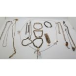 A collection of silver jewellery including bracelets, chains and necklaces