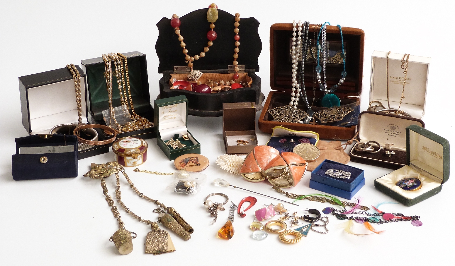 A collection of costume jewellery including brooches, beads, earrings, chatelaine, agate necklace,
