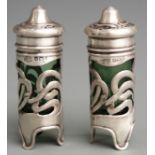 Pair of Art Nouveau hallmarked silver peppers, Birmingham 1908 maker Levi & Salaman, height 7.5cm