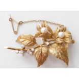 An 18ct gold brooch in the form of a flower set with pearls and diamonds, 13.4g, width 5.5cm x