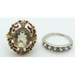 A 14k white gold ring, 2.3g, size L and a 9ct gold ring set with smoky quartz, 4.3g, size J