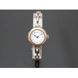 Edwardian 9ct gold ladies wristwatch with blued hands, black Arabic numerals, railroad minute track,