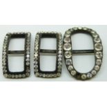 Three Victorian buckles set with paste, comprising one matched pair and one oval example