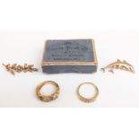 A 9ct gold dolphin brooch (0.9g), yellow metal and seed pearl brooch and an 18ct gold ring set
