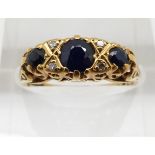 An 18ct gold ring set with sapphires and diamonds, 3.5g, size K