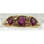 An 18ct gold ring set with rubies and diamonds, 3.8g, size M