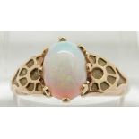 A 14k gold ring set with an oval opal cabochon, 3g, Size R