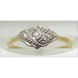 An 18ct gold ring set with diamonds in a platinum setting, 1.4g, size J