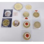 Ten "oversized/giant" commemorative coins including a 100mm example, most gold plated