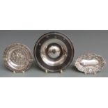 Two feature hallmarked silver pin dishes, diameter of larger 11.5cm, weight 130g and an embossed