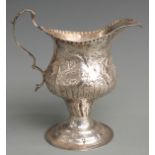 Georgian hallmarked silver pedestal jug with embossed decoration, London 1780 maker's mark TS,