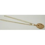 A 9ct gold locket and chain, 3.9g