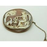 Victorian yellow metal brooch set with an unusual cameo, 4.5 x 4cm