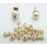 Two pearl earrings, one set with a diamond and loose pearls