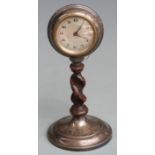 Hallmarked silver mounted desk clock with barley twist support, Chester 1930 maker Charles Perry &