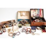 A collection of costume jewellery including bangles, beads, etc