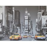 A large print of New York in silver frame.