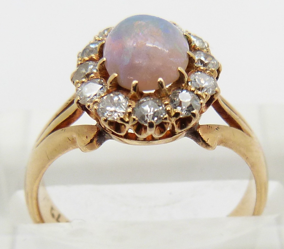 Edwardian 18ct gold ring set with an oval opal cabochon surrounded by diamonds, Birmingham 1901, 4. - Image 2 of 3
