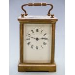 20thC French brass carriage clock with Roman enamelled dial, blued steel hands and corniche style