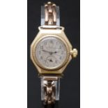 Rolex 9ct gold wristwatch with inset subsidiary seconds dial, blued hands, black Arabic numerals,