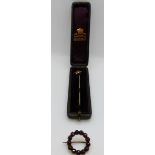 Victorian garnet brooch and a stick pin in original box