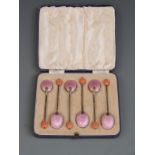 Cased set of six Art Deco pink enamel backed hallmarked silver spoons, Birmingham 1937 maker