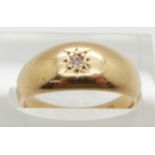 An 18ct gold ring set with a diamond in a star setting, Chester 1917, 6.3g, size N