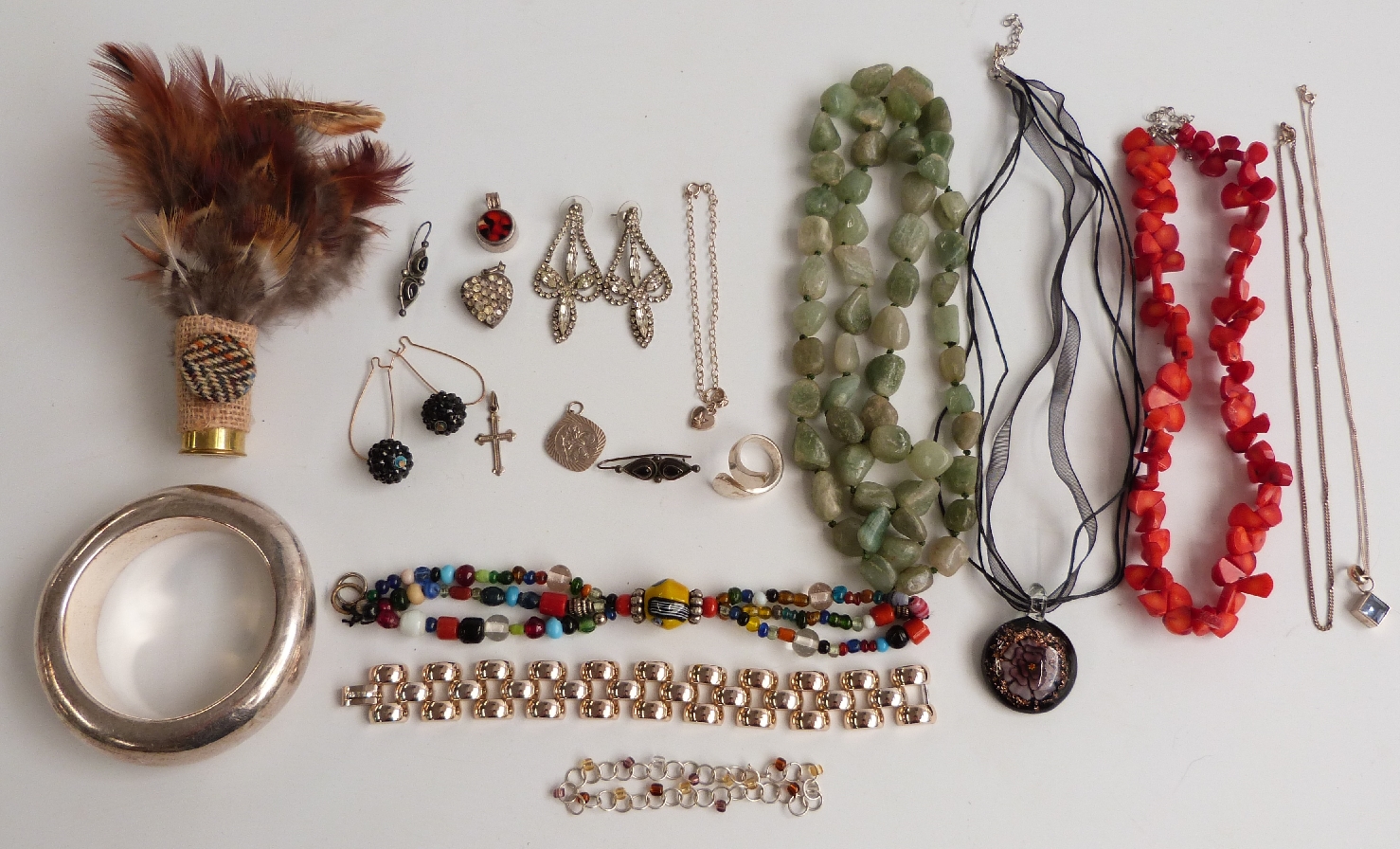 A collection of costume jewellery including agate beads, diamanté earrings, De Farre bracelet,