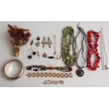 A collection of costume jewellery including agate beads, diamanté earrings, De Farre bracelet,