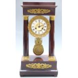 French striking 'Four Pillar' mantel clock circa mid 19thC with mahogany case with gilt decorations,