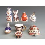A group of Royal Crown Derby ceramics to include Imari paperweights, cup and trinket dish