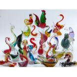 Twenty five Murano and similar glass animals, to include birds, dog, fish, horses etc, largest