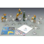 A collection of Babycham advertising ware including glasses, display models, candle, beer mats etc