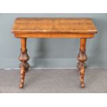 19th century burr walnut fold over games table raised on carved legs with octagonal columns, size